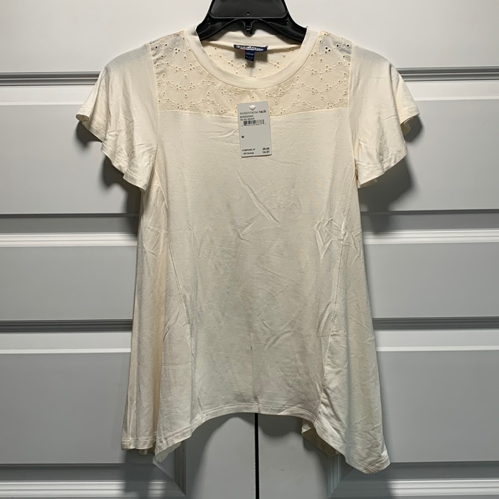 Junior freshman crewneck top with eyelet embroidery at top front and back